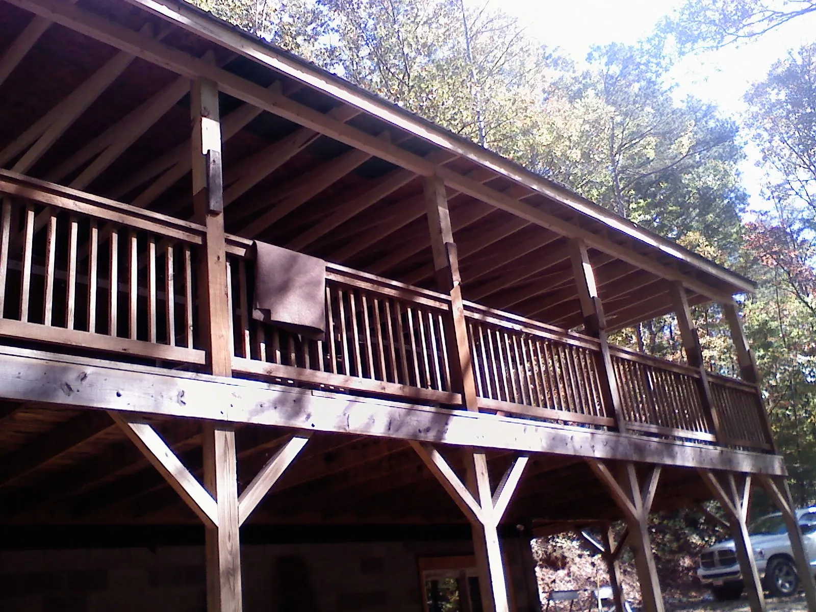Timber framing under a new elevated porch and deck — Roof Leak Repair in Shellsburg by Roofing Brothers